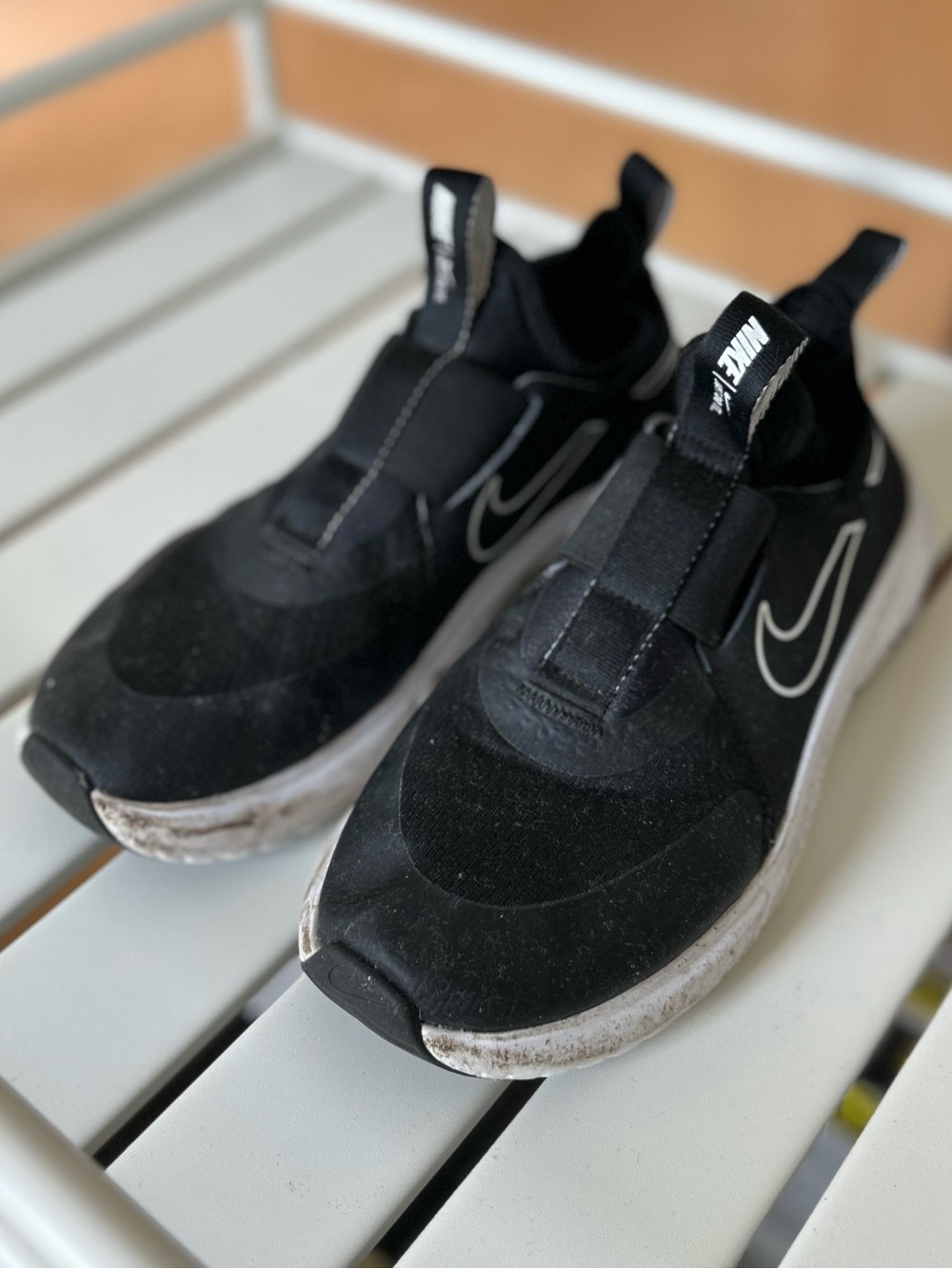 Nike Kids Black and White Slip-On Sneakers